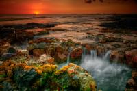 Sunset at Pele's Well by Thomas (Tom) Upton