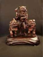 Japanese Carved Wooden Lion Dance Figures by Unknown Unknown