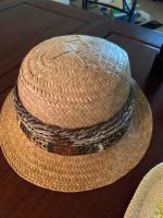 Lauhala Hat, small brim with feather lei by Unknown Unknown